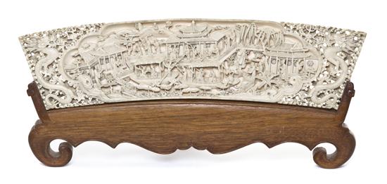 *A Chinese Carved Ivory Plaque the well