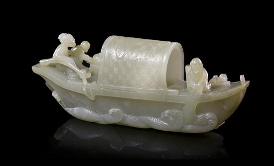 A Carved Jade Boat Figural Group of