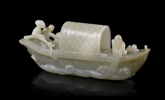 A Carved Jade Boat Figural Group