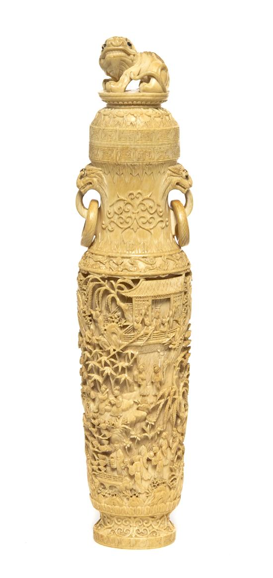 *A Chinese Lidded Ivory Vase of