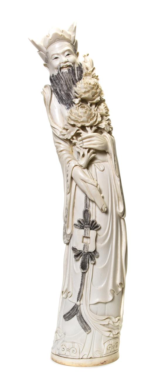A Chinese Carved Ivory figure of