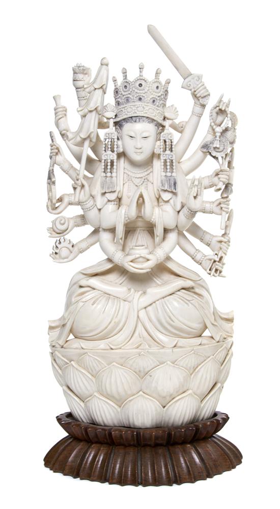 A Chinese Ivory Carving of a Multi-Armed