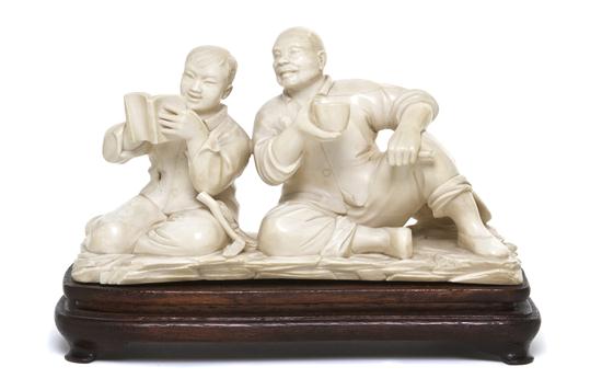 A Chinese Ivory Carving of Two