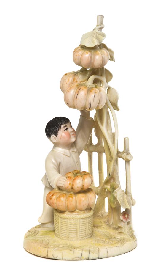 A Chinese Ivory Figure of a Boy
