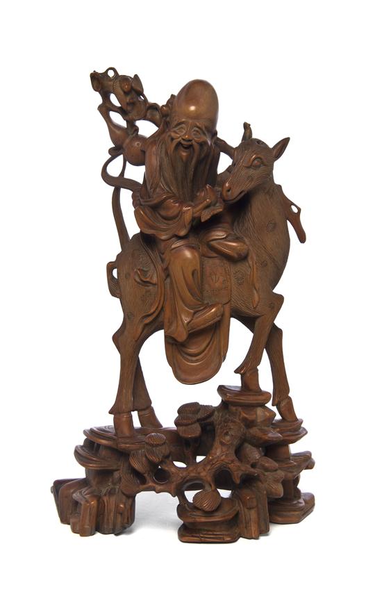 A Chinese Wood Carving of Shoulao 152fe9