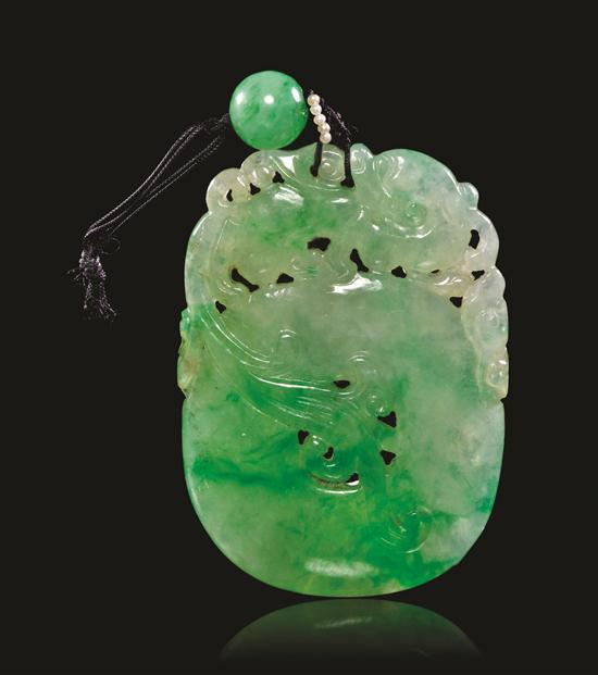 A Jadeite Pendant of apple green and