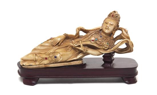 *An Ivory Carving of a Reclining