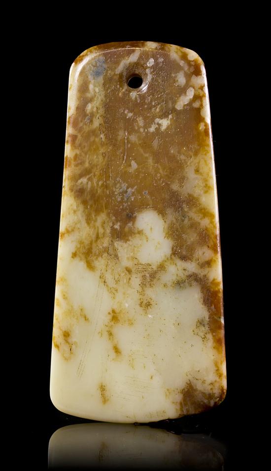 A Mottled Jade Plaque of russet and