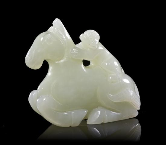 A Carved Jade Toggle depicted a 153096