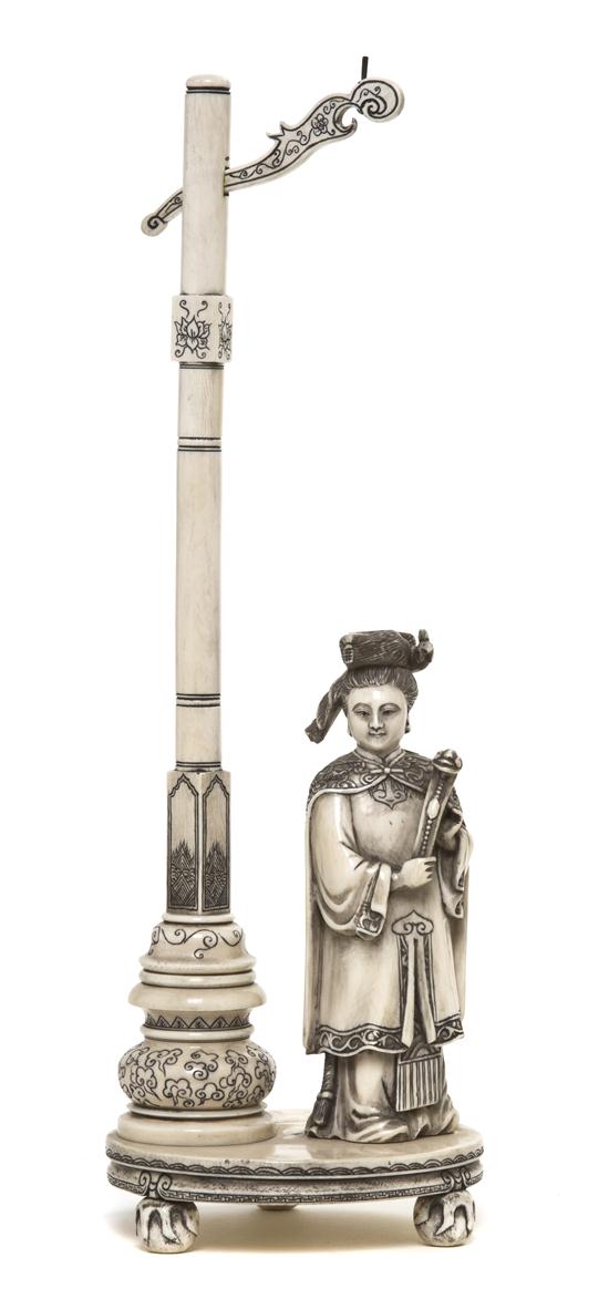 An Ivory Carving of a Lady the figure