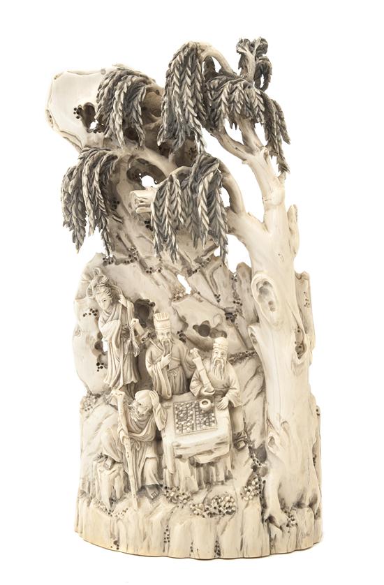 A Chinese Carved Ivory Figure of