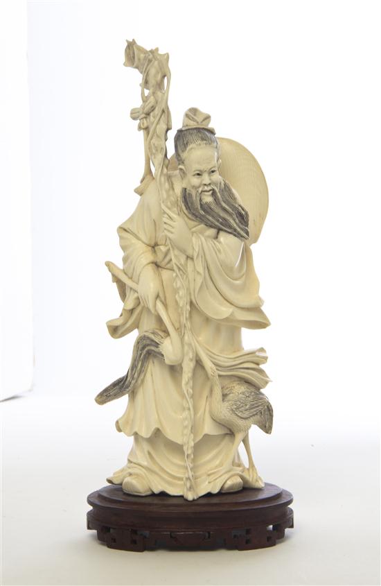  A Carved Ivory Figure depicting 1530af
