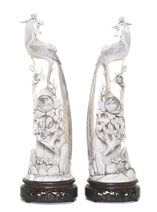 A Pair of Chinese Ivory Birds each depicted