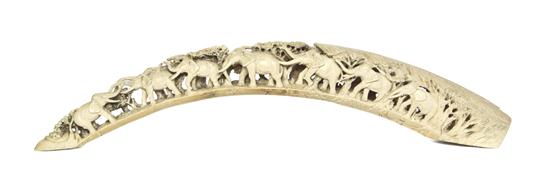 A Chinese Carved Ivory Model of an Elephant