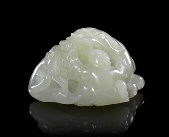A Carved Jade Toggle of pale celadon 153102