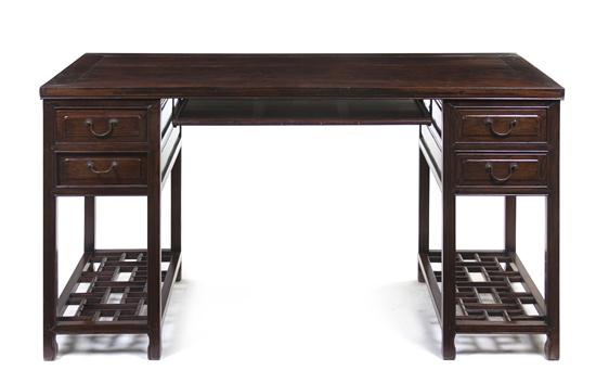 A Chinese Hardwood Pedestal Desk