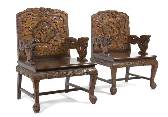 A Group of Six Carved Wood Chairs