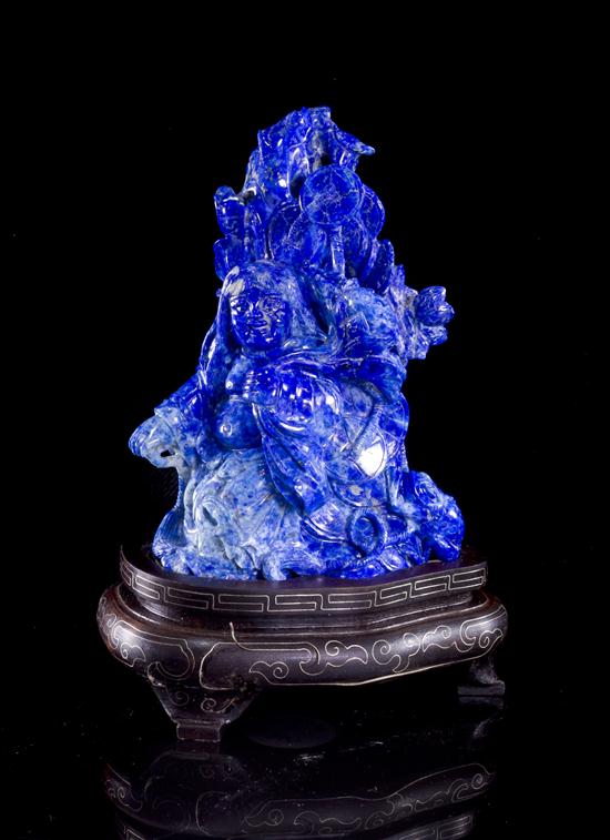 A Carved Lapis Lazuli Figural Carving