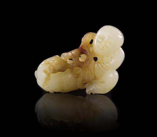 A White Jade Toggle of a Boy and 15316d