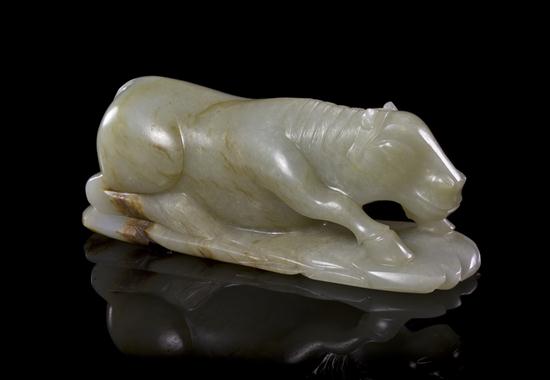 A White Jade Carving of a Recumbent 153172