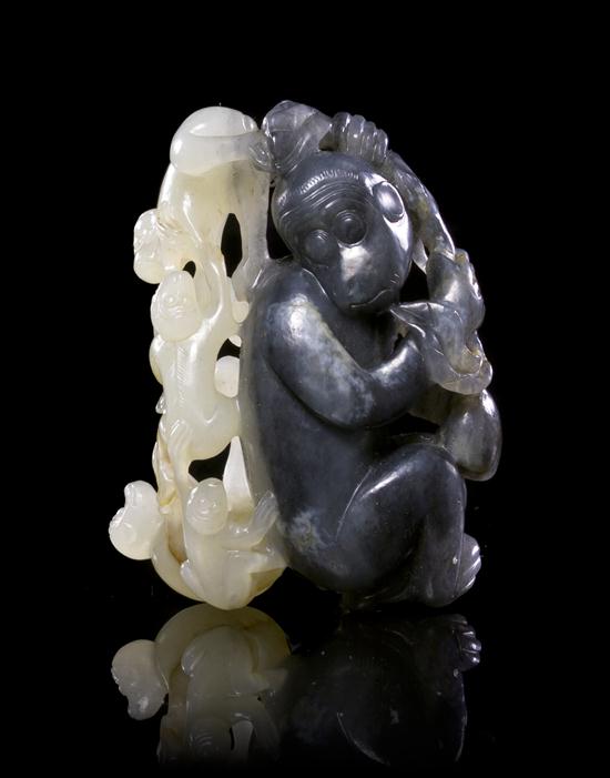 A Pierce Carved Black and White Jade