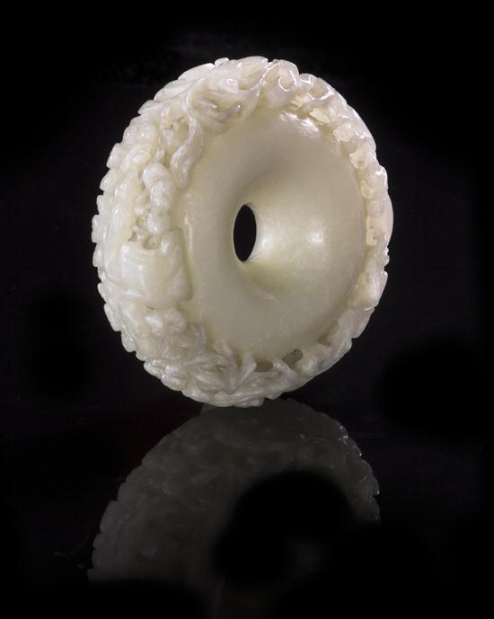 A White Jade Disk with Foliate 153182