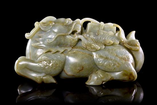 A Carved Jade Qiling Bearing a 15318e