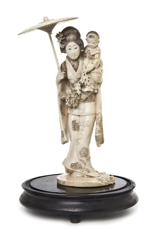 A Japanese Ivory Figure of a Woman 1531d6