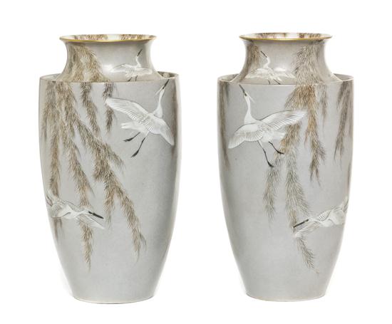 A Pair of Japanese Porcelain Vases having