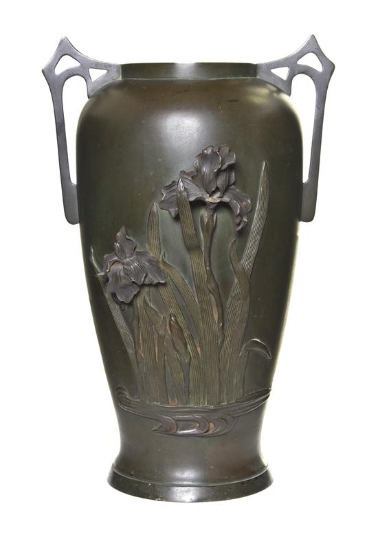 A Japanese Bronze Urn having angular