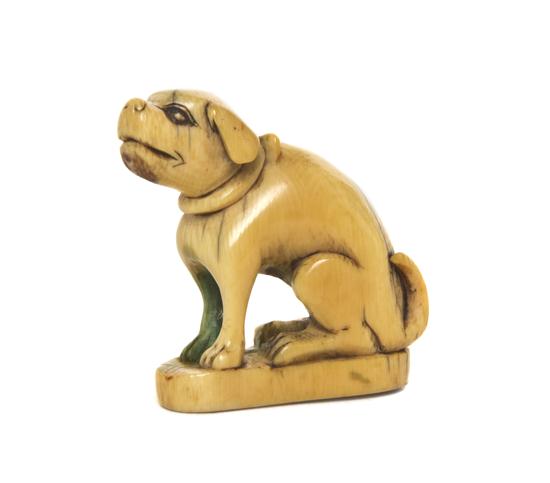 An Ivory Dog Netsuke depicted seated 1531e9