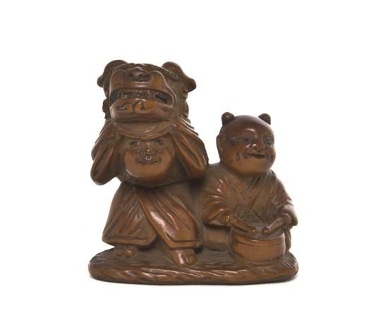 A Boxwood Netsuke depicting two 1531f9