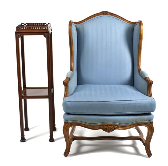 An Upholstered Armchair and Plant 15323f