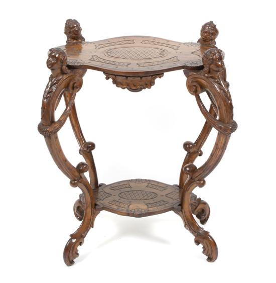 A Baroque Style Carved Walnut Occasional