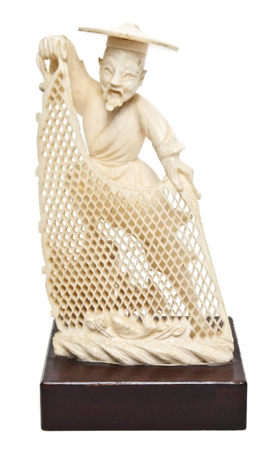 A Chinese Carved Ivory Figure of