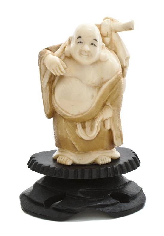 A Japanese Carved Ivory Figure of a