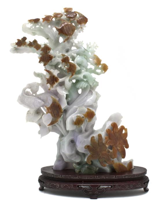 A Chinese Carved Jadeite Group 153345