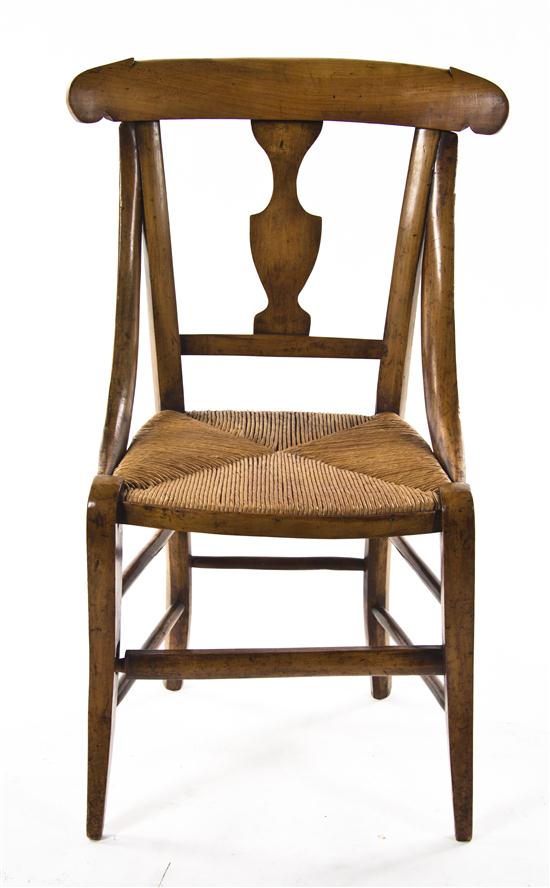 *A Continental Fruitwood Childs Chair