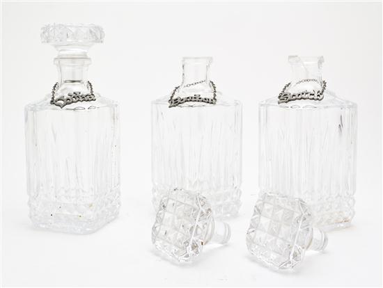 A Set of Three Molded Glass Decanters 15347c