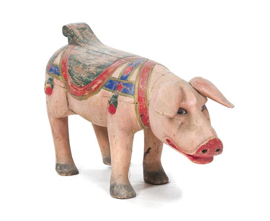 A Carved Wood Polychrome Decorated Pig