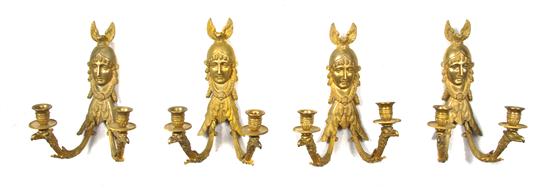 A Set of Four Empire Style Gilt Bronze