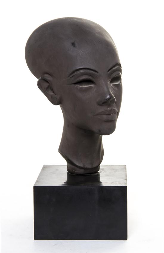 *A Cast Metal Bust depicting Nefertiti