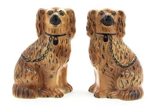 *A Pair of Staffordshire Spaniels