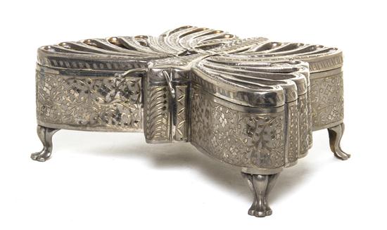 *A Silvered Metal Music Box in