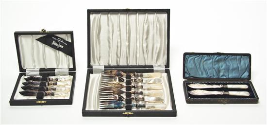 A Group of Cased Flatware Articles comprising