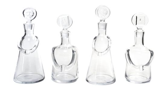 A Collection of Four Figural Glass 151114