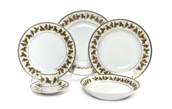 A Partial French Porcelain Dinner Service