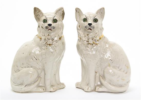 A Pair of Staffordshire Cats each in