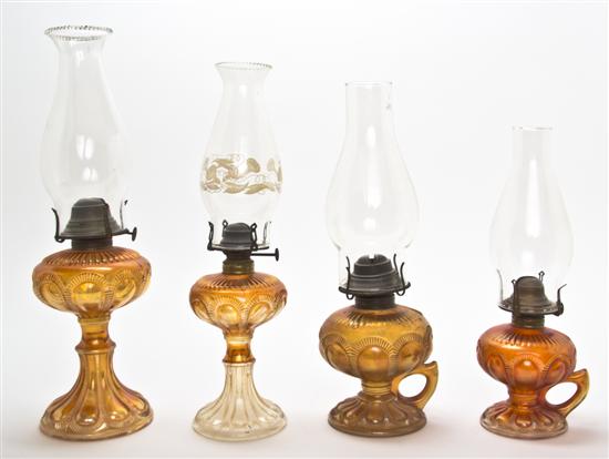 Four Carnival Glass Fluid Lamps each