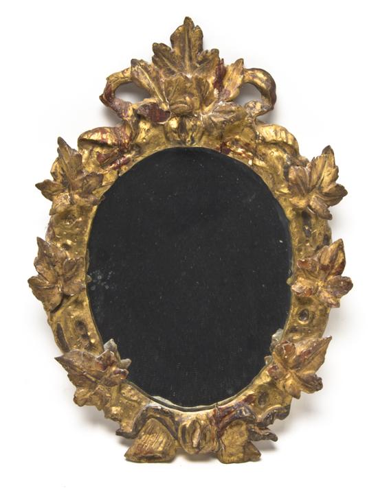  An Italian Giltwood Mirror having 151218